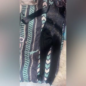 One piece jumpsuit with one long sleeve shoulder cut